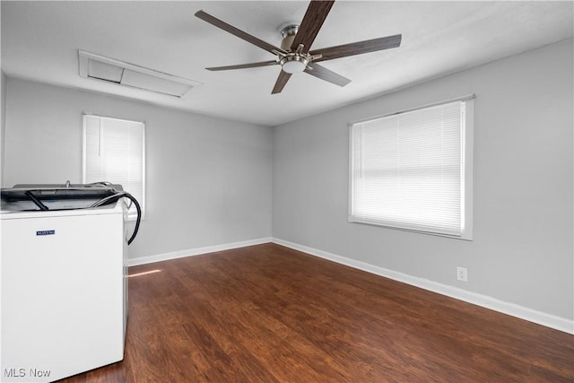 348 Elberta Dr, Vermilion, OH 44089 - empty room featuring wood finished floors, ceiling fan, attic access, and baseboards