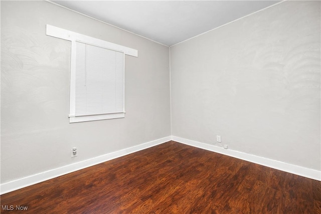 348 Elberta Dr, Vermilion, OH 44089 - unfurnished room with baseboards and wood finished floors