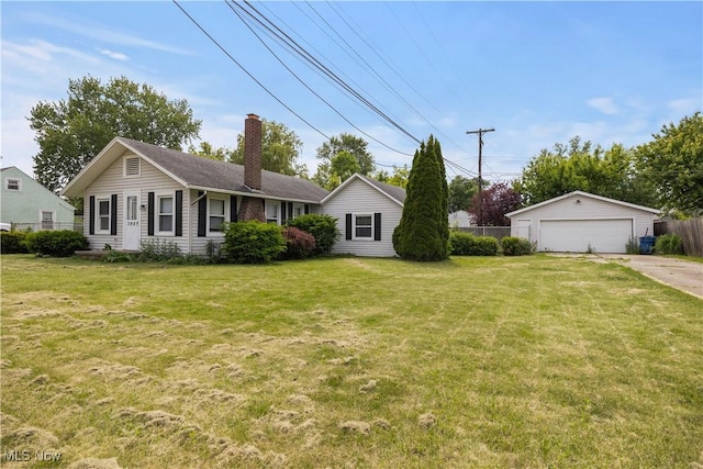 348 Elberta Dr, Vermilion, OH 44089 - ranch-style home with a chimney, a detached garage, and an outbuilding