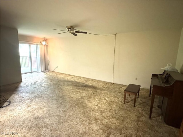 2540 N River Rd NE Unit C7, Warren, OH 44483 - spare room with ceiling fan and carpet floors