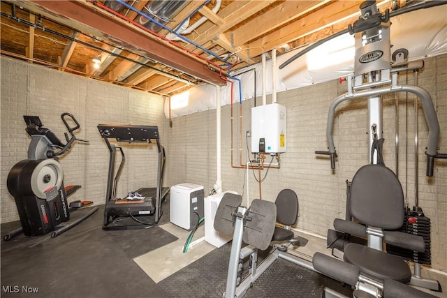 4340 Castlegate Blvd, Uniontown, OH 44685 - exercise area featuring tankless water heater