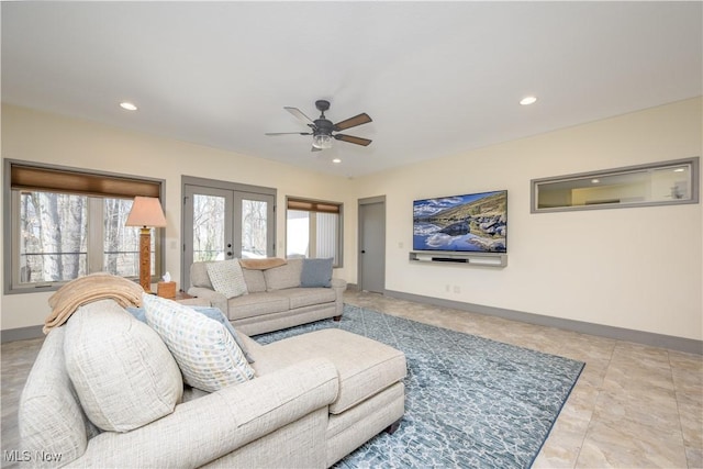 4340 Castlegate Blvd, Uniontown, OH 44685 - living room with french doors, a ceiling fan, baseboards, and recessed lighting