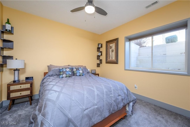 4340 Castlegate Blvd, Uniontown, OH 44685 - bedroom with carpet floors, baseboards, and a ceiling fan