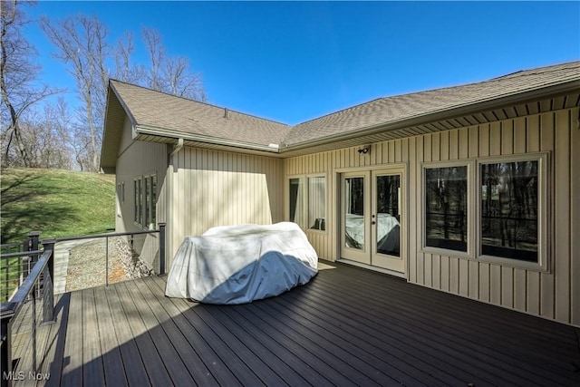4340 Castlegate Blvd, Uniontown, OH 44685 - wooden terrace with french doors