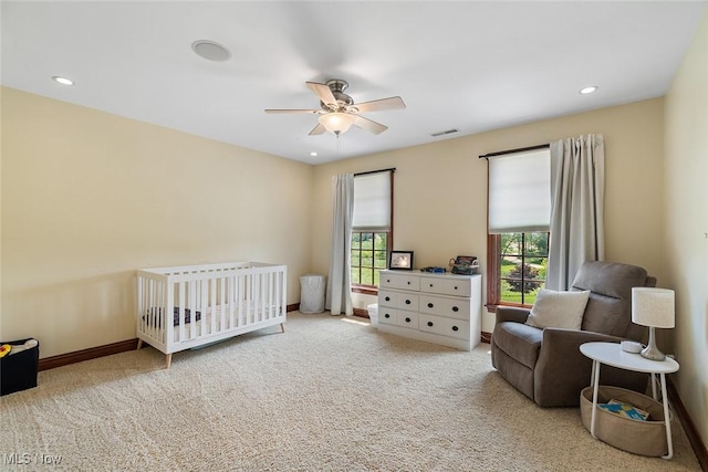 5495 Meese Rd NE, Louisville, OH 44641 - carpeted bedroom featuring recessed lighting, a nursery area, baseboards, and a ceiling fan