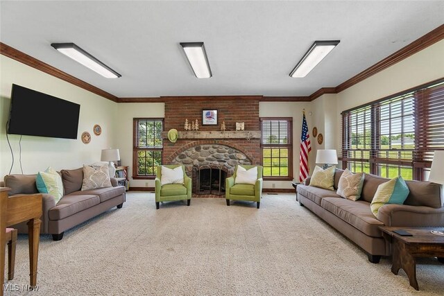 5495 Meese Rd NE, Louisville, OH 44641 - carpeted living room featuring plenty of natural light, ornamental molding, and a fireplace