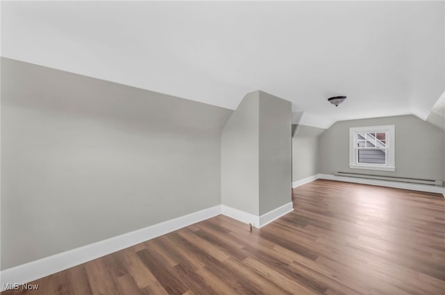 3528 Daleford Rd, Shaker Heights, OH 44120 - bonus room with baseboard heating, wood finished floors, lofted ceiling, and baseboards