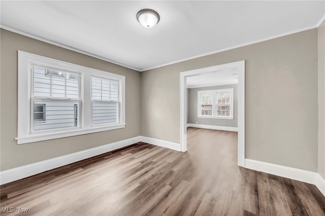 3528 Daleford Rd, Shaker Heights, OH 44120 - spare room featuring baseboards, wood finished floors, and crown molding