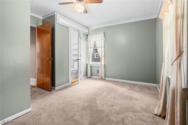 674 Columbus Ave, Akron, OH 44306 - unfurnished bedroom featuring crown molding, carpet, baseboards, and ceiling fan