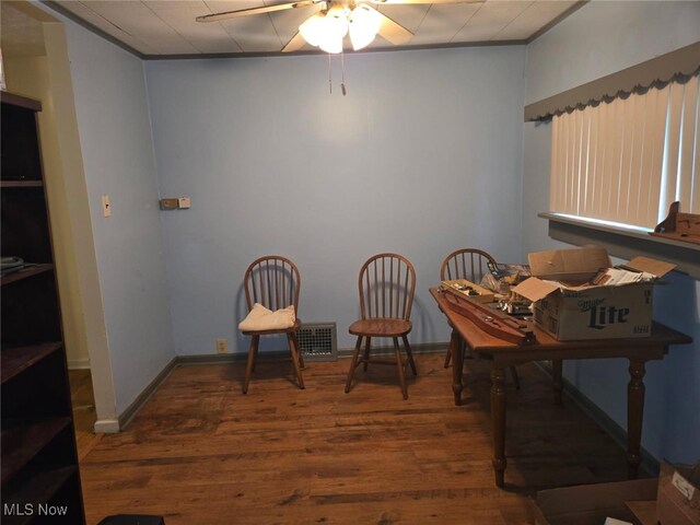 332 Stull Ave, Akron, OH 44312 - living area featuring a ceiling fan and wood finished floors