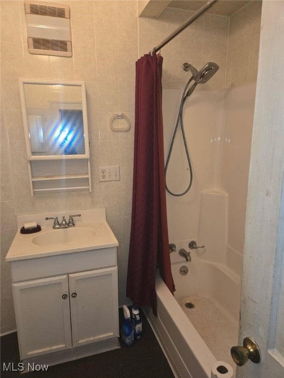 332 Stull Ave, Akron, OH 44312 - bathroom featuring vanity, tile walls, and shower / bath combination with curtain