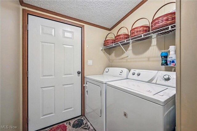 1270 S Lincoln Ave Unit A, Salem, OH 44460 - laundry area with washing machine and clothes dryer, ornamental molding, and a textured ceiling