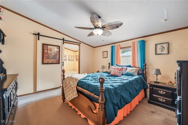 1270 S Lincoln Ave Unit A, Salem, OH 44460 - bedroom featuring vaulted ceiling, crown molding, a barn door, baseboards, and ensuite bath
