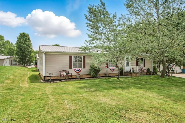 1270 S Lincoln Ave Unit A, Salem, OH 44460 - rear view of property with a lawn, metal roof, and covered porch