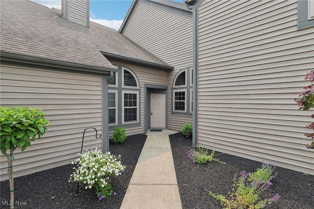 322 N Bayshore Dr Unit 3, Columbiana, OH 44408 - entrance to property featuring a shingled roof and a chimney