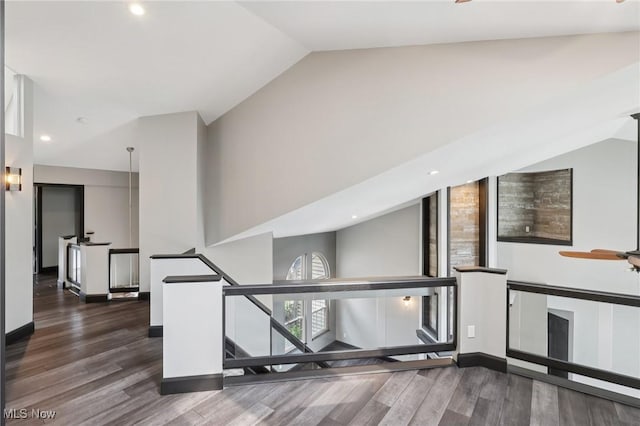 322 N Bayshore Dr Unit 3, Columbiana, OH 44408 - corridor with an upstairs landing, wood finished floors, recessed lighting, baseboards, and high vaulted ceiling