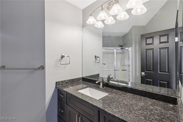 322 N Bayshore Dr Unit 3, Columbiana, OH 44408 - full bath featuring a stall shower, vanity, and a chandelier