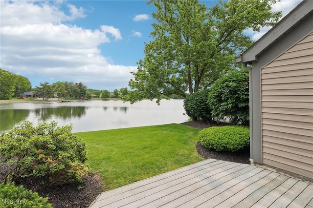 322 N Bayshore Dr Unit 3, Columbiana, OH 44408 - view of green lawn with a deck with water view