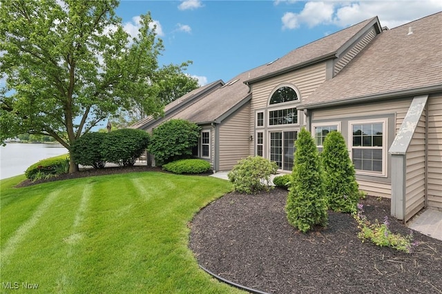 322 N Bayshore Dr Unit 3, Columbiana, OH 44408 - view of green lawn featuring a water view