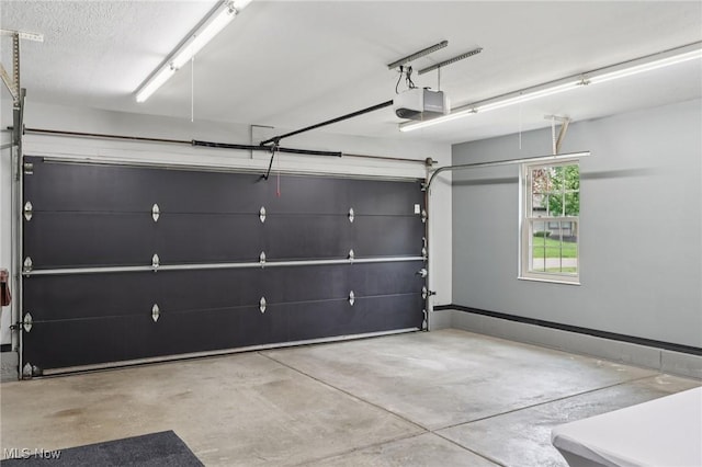 322 N Bayshore Dr Unit 3, Columbiana, OH 44408 - garage featuring a garage door opener