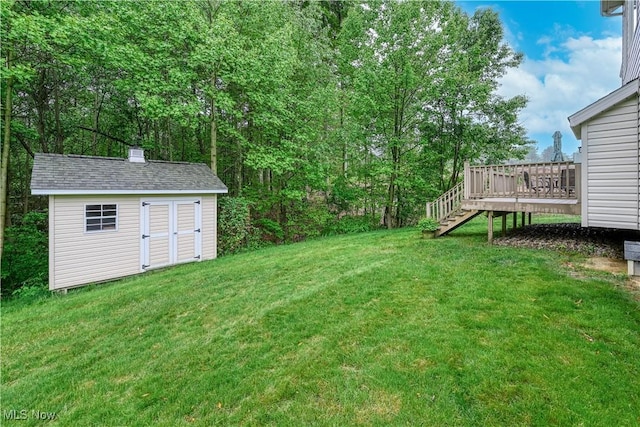 536 Silver Creek Dr, Doylestown, OH 44230 - view of green lawn featuring a wooden deck and stairs