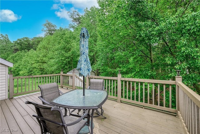 536 Silver Creek Dr, Doylestown, OH 44230 - wooden deck with outdoor dining space