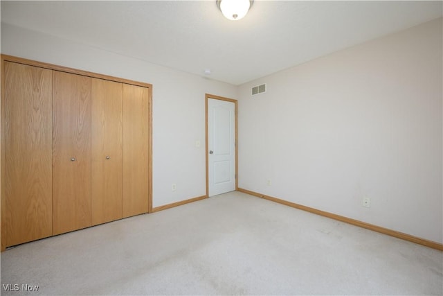 536 Silver Creek Dr, Doylestown, OH 44230 - unfurnished bedroom with a closet, baseboards, and carpet