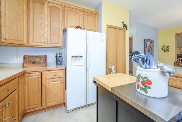 536 Silver Creek Dr, Doylestown, OH 44230 - kitchen with white refrigerator with ice dispenser, light countertops, and light brown cabinets