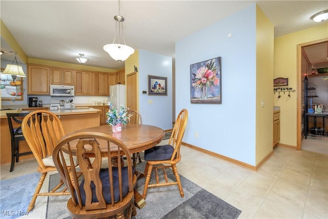 536 Silver Creek Dr, Doylestown, OH 44230 - dining space with baseboards