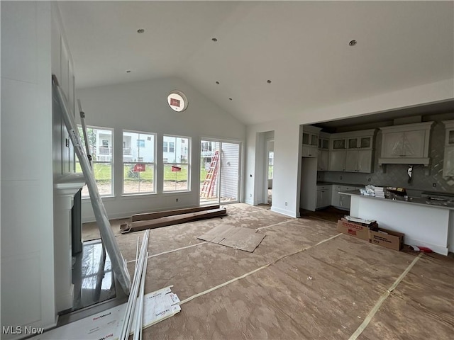 8937 Camden Rd NW, Massillon, OH 44646 - living room with high vaulted ceiling