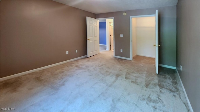 28360 Center Ridge Rd Unit 218, Westlake, OH 44145 - unfurnished bedroom featuring carpet floors and baseboards