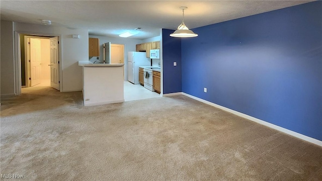 28360 Center Ridge Rd Unit 218, Westlake, OH 44145 - unfurnished living room with light carpet and baseboards