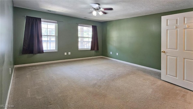 28360 Center Ridge Rd Unit 218, Westlake, OH 44145 - carpeted empty room with ceiling fan, baseboards, and a textured ceiling