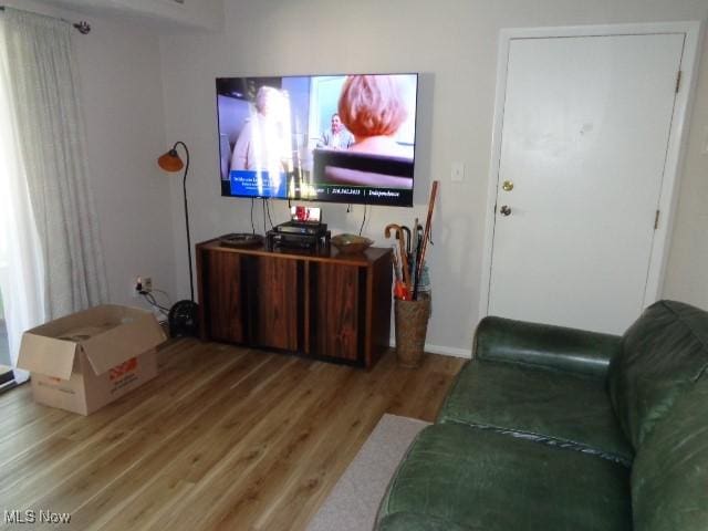 16395 Heather Ln Unit 201, Middleburg Heights, OH 44130 - living room with wood finished floors and baseboards