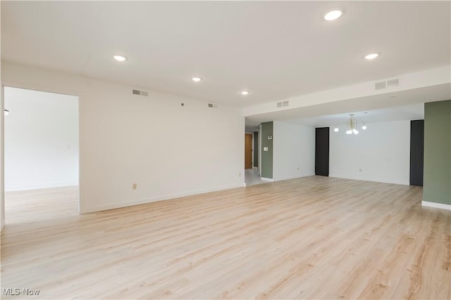 100 Fox Hollow Dr Unit 302, Mayfield Heights, OH 44124 - empty room featuring light wood-type flooring, recessed lighting, baseboards, and a chandelier