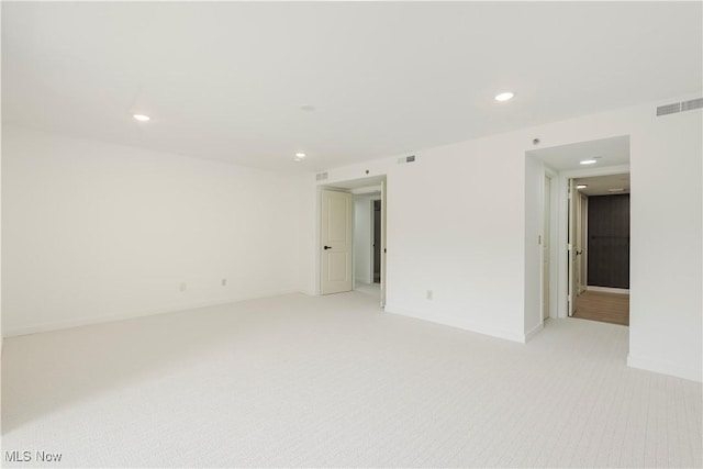 100 Fox Hollow Dr Unit 302, Mayfield Heights, OH 44124 - spare room featuring light carpet, recessed lighting, and baseboards