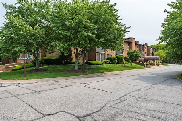 100 Fox Hollow Dr Unit 302, Mayfield Heights, OH 44124 - obstructed view of property with a front lawn