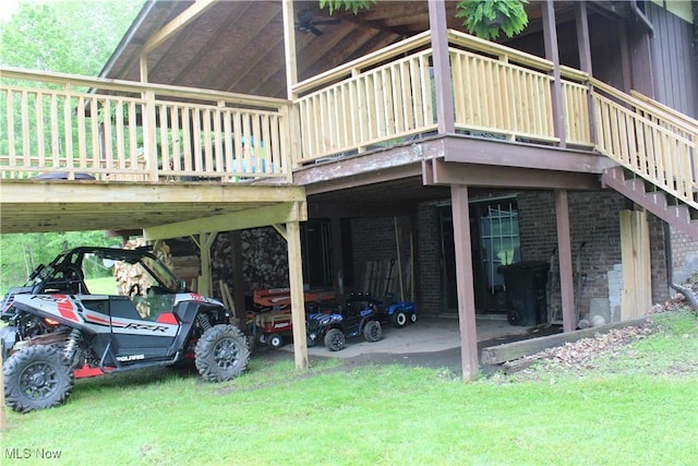 666 E Windsor Rd, Orwell, OH 44076 - view of property exterior with brick siding, a carport, a deck, and a lawn