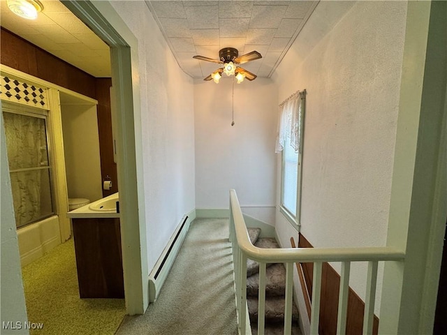 99 W Martin St, East Palestine, OH 44413 - corridor with a baseboard radiator and carpet flooring