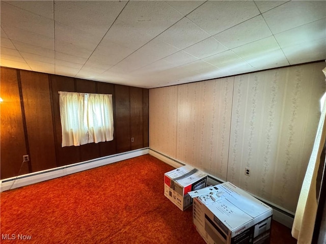 99 W Martin St, East Palestine, OH 44413 - unfurnished room with a baseboard heating unit and dark colored carpet