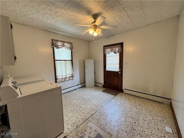 99 W Martin St, East Palestine, OH 44413 - laundry area with washer and dryer, baseboard heating, cabinet space, a ceiling fan, and healthy amount of natural light
