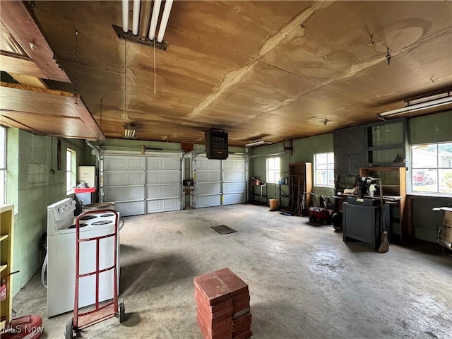 99 W Martin St, East Palestine, OH 44413 - garage featuring washer / dryer and a heating unit