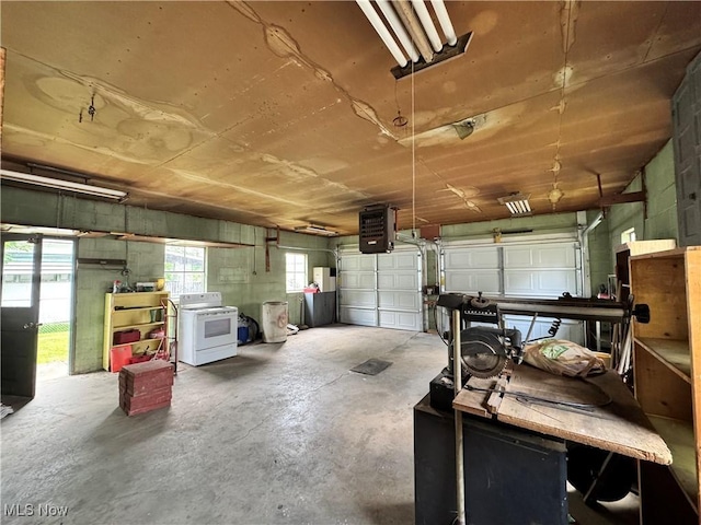 99 W Martin St, East Palestine, OH 44413 - garage featuring a heating unit and concrete block wall