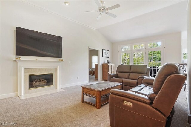 1983 Fox Trace Trl, Cuyahoga Falls, OH 44223 - living area with light colored carpet, ceiling fan, vaulted ceiling, a fireplace, and baseboards