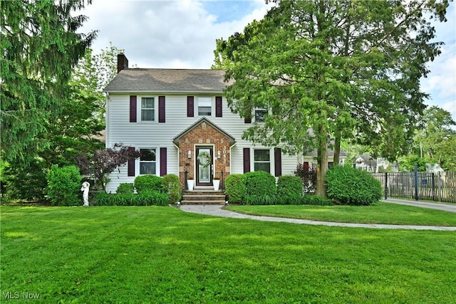 3053 E Market St, Warren, OH 44483 - colonial inspired home with a chimney and brick siding