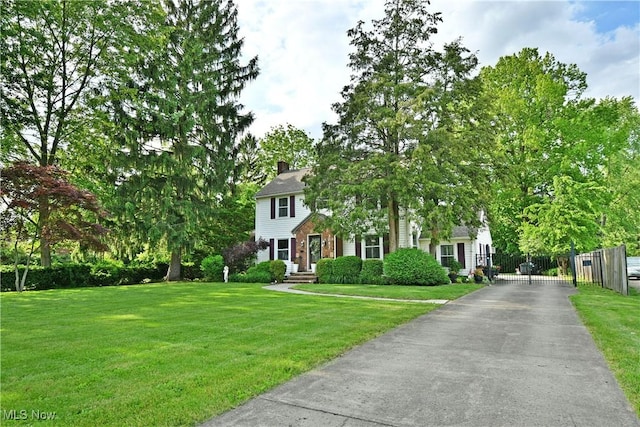3053 E Market St, Warren, OH 44483 - view of front facade featuring a chimney and a gate