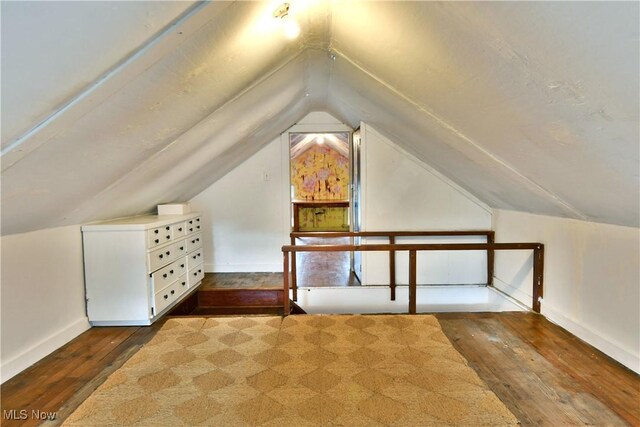 3053 E Market St, Warren, OH 44483 - bonus room with dark wood-type flooring, vaulted ceiling, and baseboards