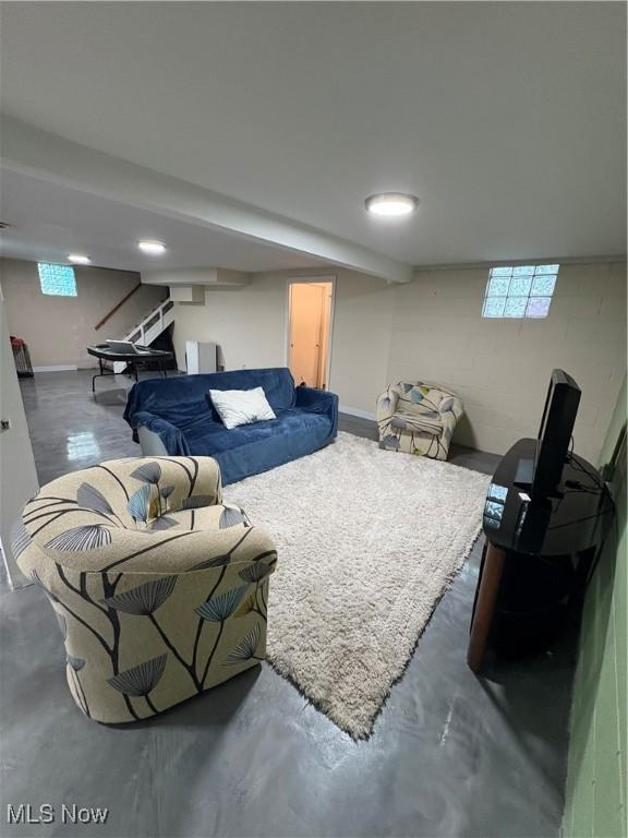 803 N 7th St, Cambridge, OH 43725 - living area with concrete block wall