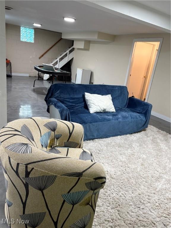 803 N 7th St, Cambridge, OH 43725 - living area featuring baseboards