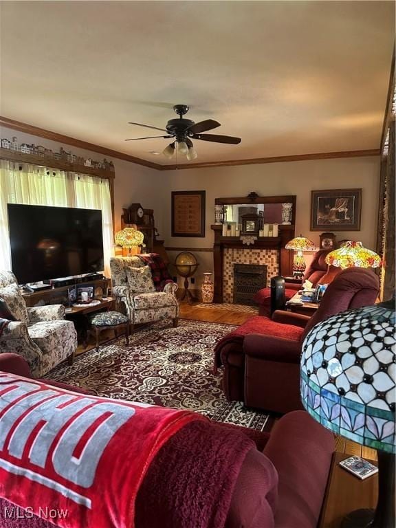 51001 Run Rd, Beallsville, OH 43716 - living area with crown molding, a ceiling fan, and a fireplace